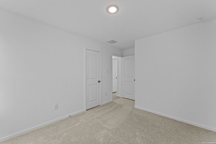 Spacious, unfurnished interior of a new home in Guadalupe Ridge, New Braunfels (Image 13).