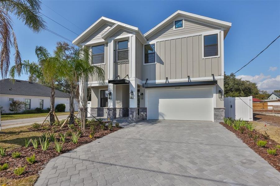 Front exterior of a new home in , Tampa, FL, highlighting curb appeal (Image 20).