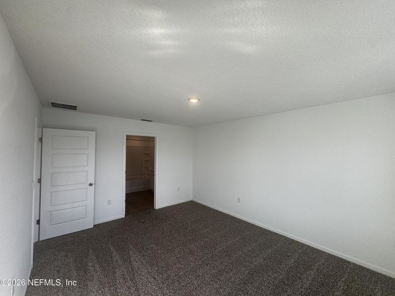 Spacious, unfurnished interior of a new home in The Arbors, Jacksonville (Image 32).