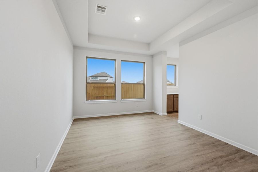 Spacious, unfurnished interior of a new home in Canterra Creek  60', Iowa Colony (Image 36).