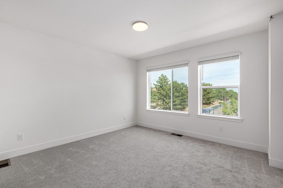 Representative unfurnished interior of a home built from the Danielle by Lokal Homes in Ascent at Inverness, Englewood (Image 16).