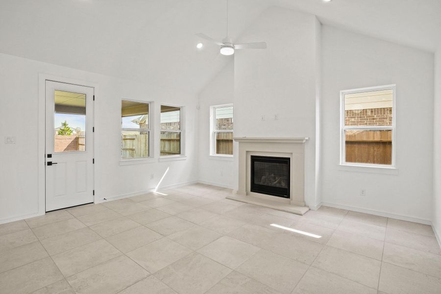 Impressive great room with cozy fireplace (*Photo not of actual home and used for illustration purposes only.) Impressive great room with cozy fireplace (*Photo not of actual home and used for illustration purposes only.)