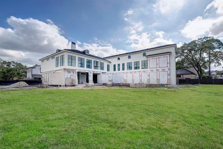 Exterior of home on large corner lot in Tanglewood. Stage of construction as of February 6, 2025. Exterior of home on large corner lot in Tanglewood. Stage of construction as of February 6, 2025.