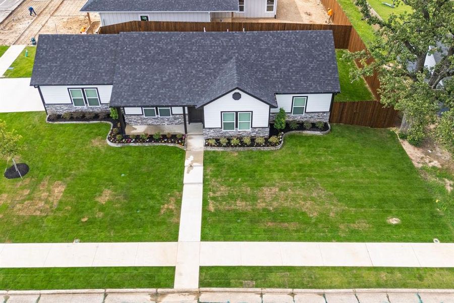 Front exterior of a new home in , Sulphur Springs, TX, highlighting curb appeal (Image 23). Front exterior of a new home in , Sulphur Springs, TX, highlighting curb appeal (Image 23).