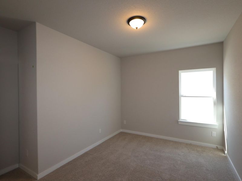 Spacious, unfurnished interior of a new home in Heritage, Dripping Springs (Image 9).