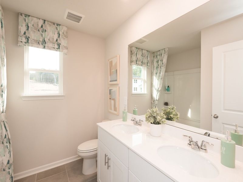 Secondary bathroom in the Paisley at a Meritage Homes community in Holly Springs, GA.