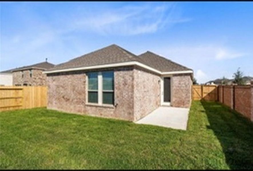 Exterior details and patio area of a home in Sunterra, Katy (Image 3).