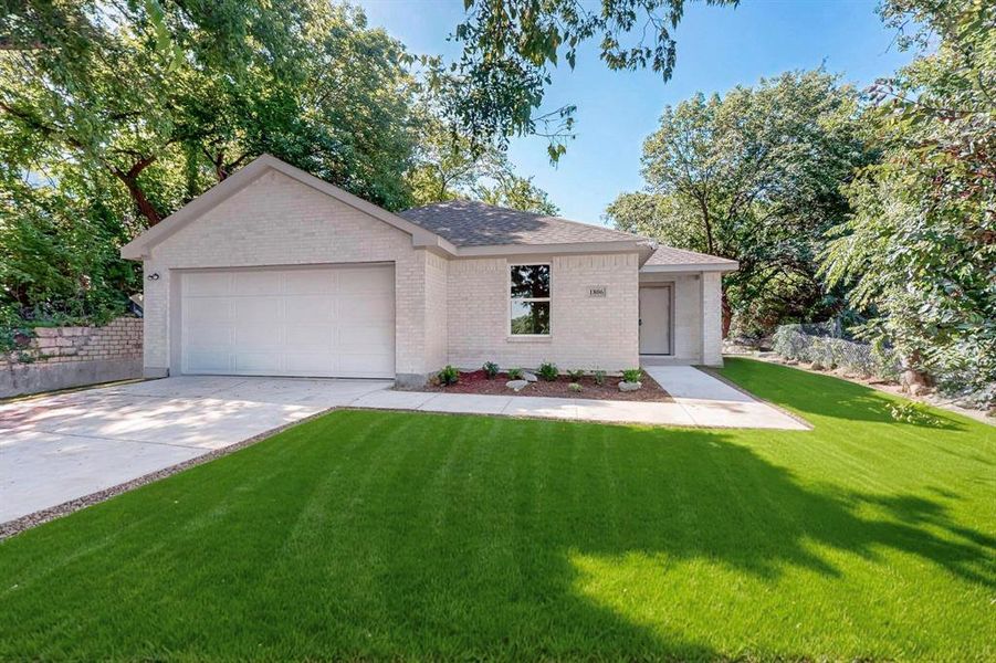 Front exterior of a new home in , Dallas, TX, highlighting curb appeal (Image 1).