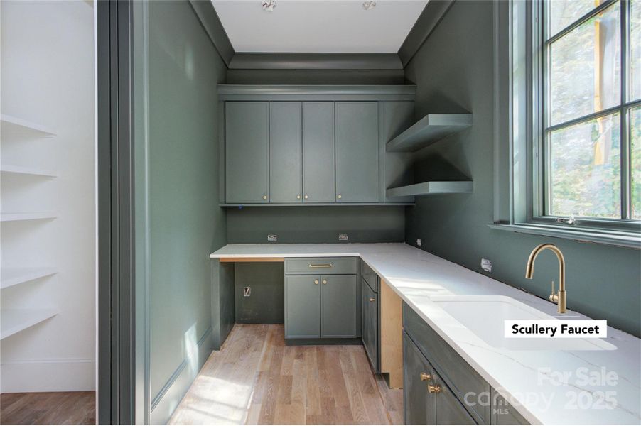 Scullery with pantry to the left Scullery with pantry to the left