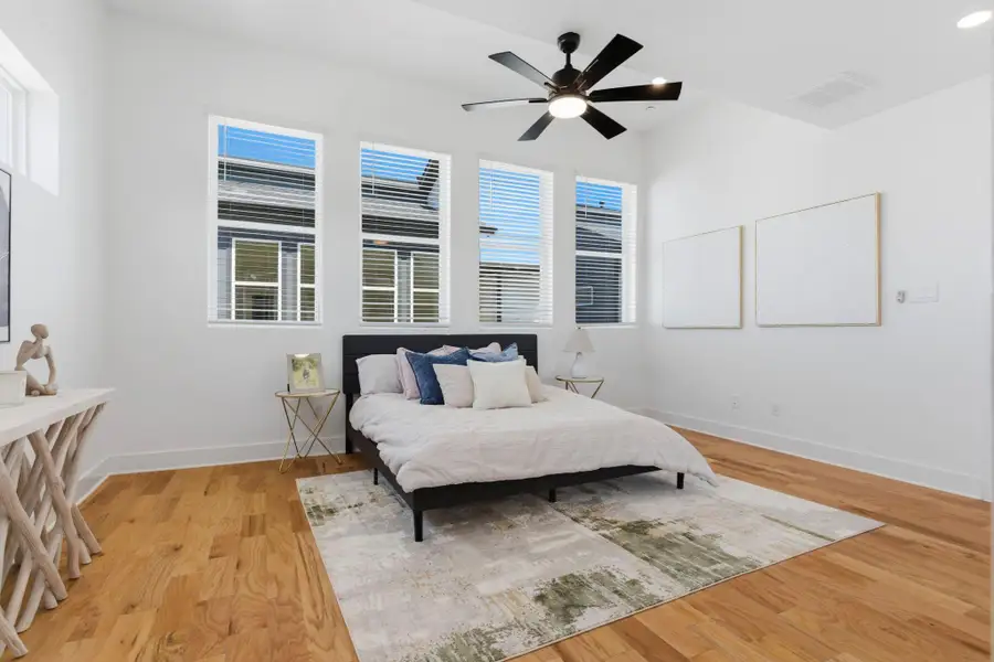 Private third-floor primary retreat offering peace and separation, designed for ultimate comfort and relaxation.