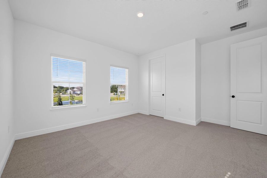 Spacious, unfurnished interior of a new home in Lake Cawood Cove, Windermere (Image 15).
