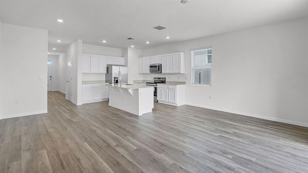 Spacious, unfurnished interior of a new home in Harmony at Lake Eloise, Winter Haven (Image 13).