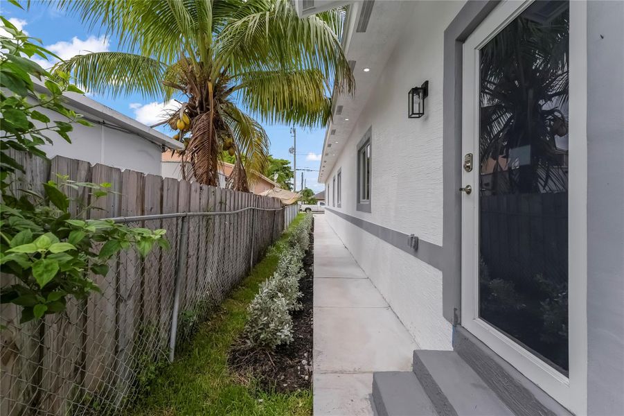 Front exterior of a new home in , West Park, FL, highlighting curb appeal (Image 16).