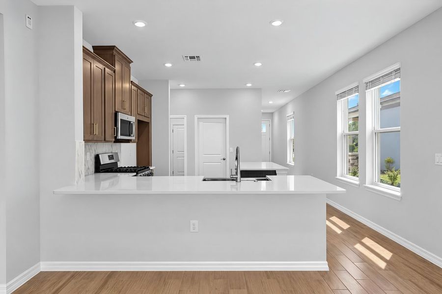 Furnished interior view inside a new home in Lochside, Mount Dora (Image 9). Furnished interior view inside a new home in Lochside, Mount Dora (Image 9).