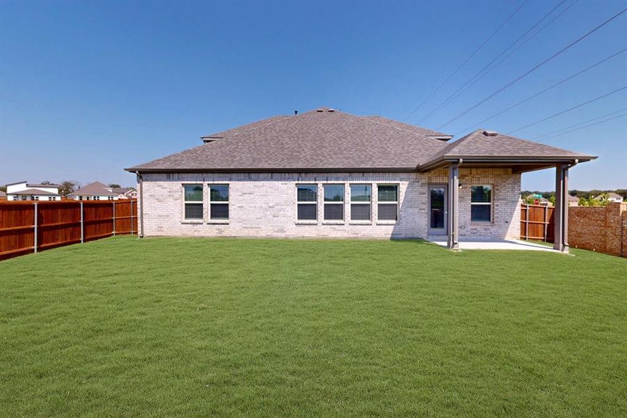 Front exterior of a new home in Kings Way, Denton, TX, highlighting curb appeal (Image 19).