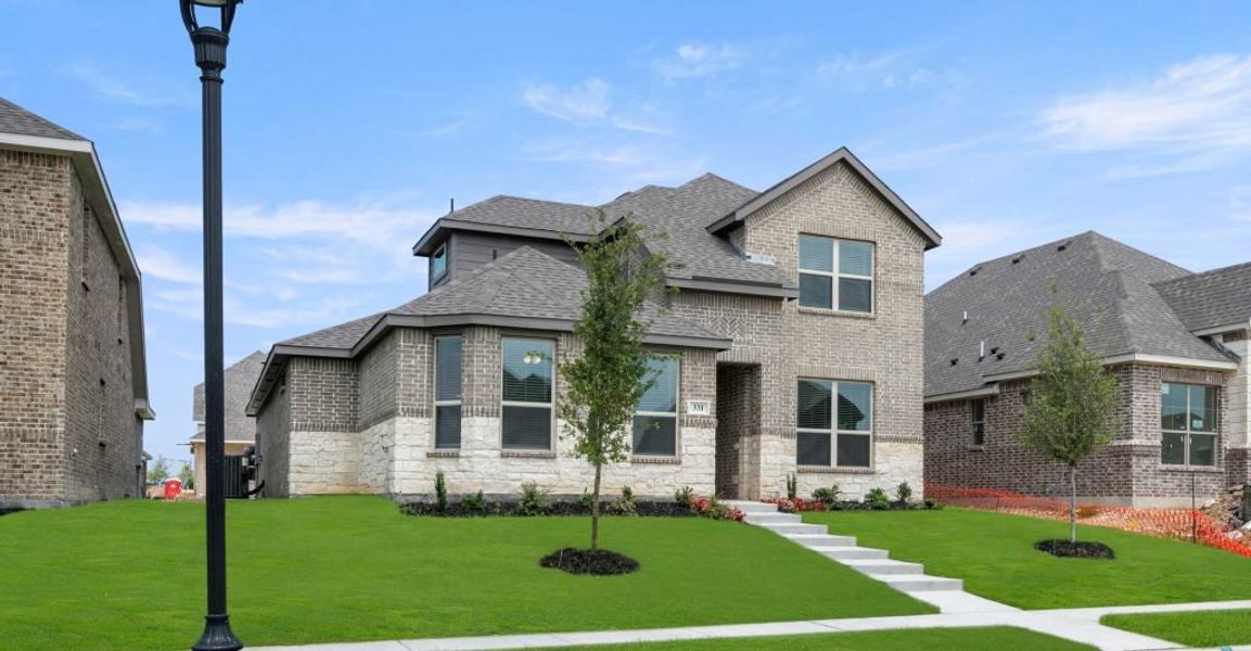 Representative exterior photo of a completed home built from the Dozier by Impression Homes in Redden Farms, Midlothian, TX (Image 2). Representative exterior photo of a completed home built from the Dozier by Impression Homes in Redden Farms, Midlothian, TX (Image 2).
