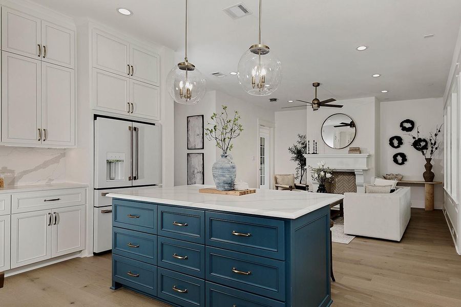 Deep and wide drawer storage is a sought-after feature and convenient. Premium GE Cafe appliances include the beautiful refrigerator.