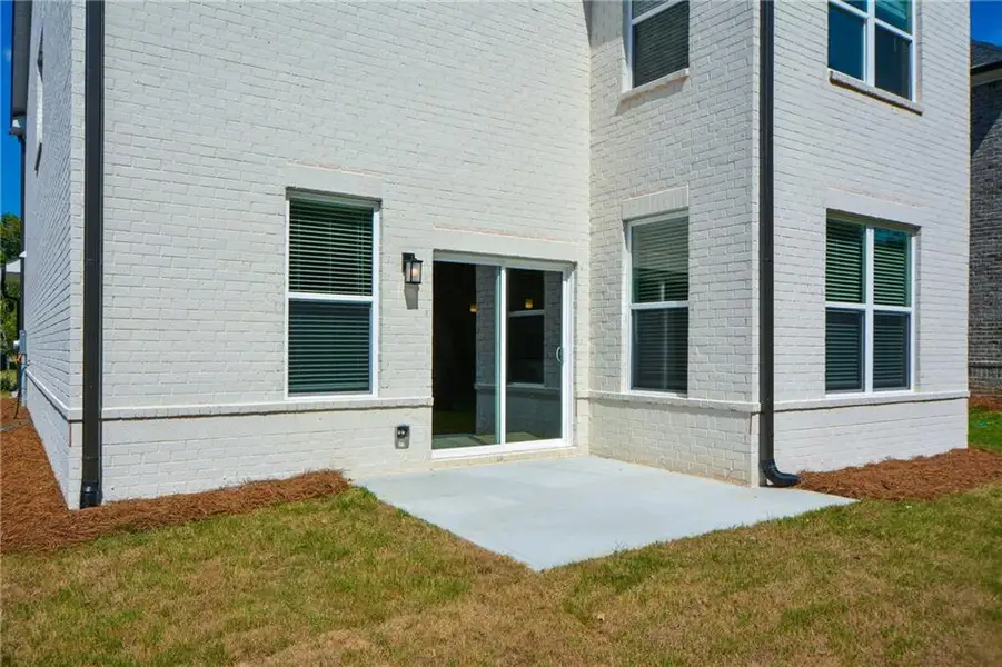 Exterior details and patio area of a home in Graystone Village, Grayson (Image 28).