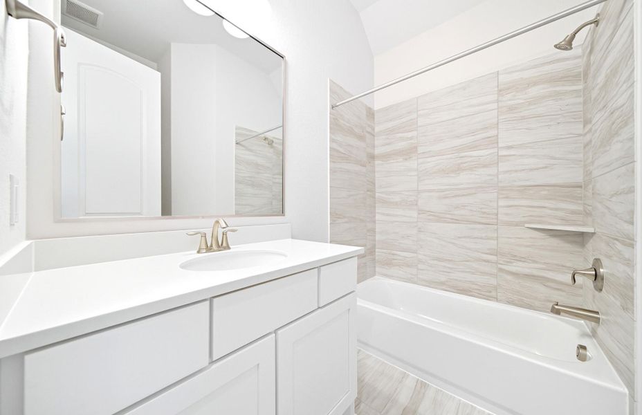 Furnished interior view inside a new home in Bridgeland 60′, Cypress (Image 10).
