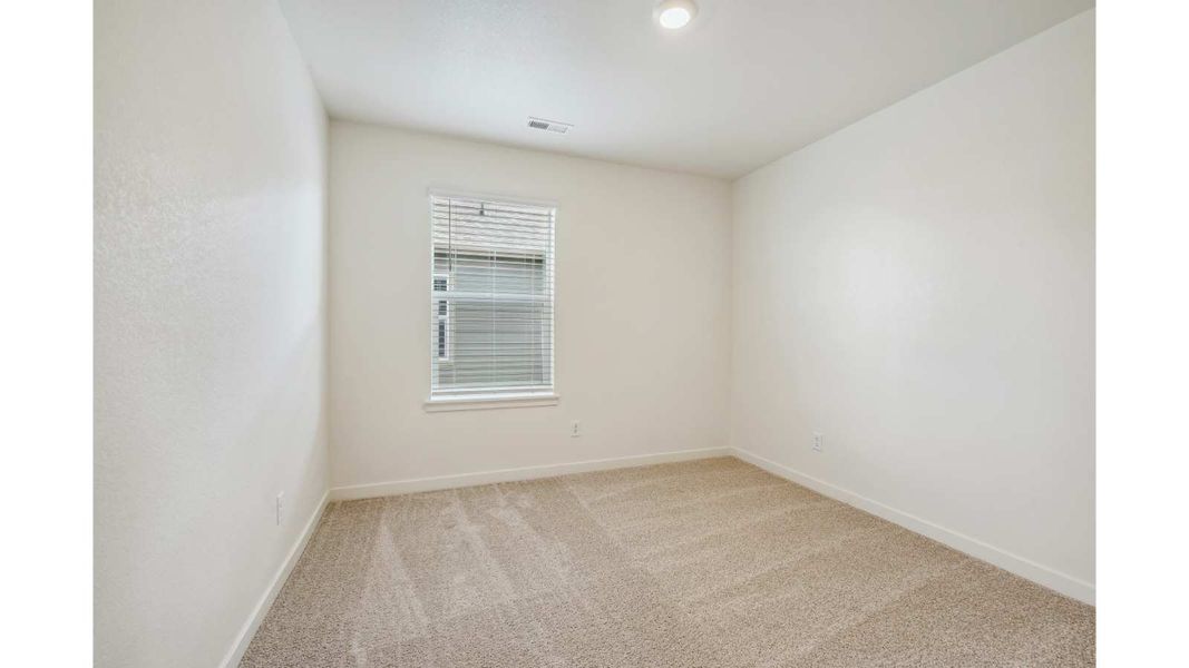 Representative unfurnished interior of a home built from the ELDER II by D.R. Horton in The Ridge at Lorson Ranch, Colorado Springs (Image 14).