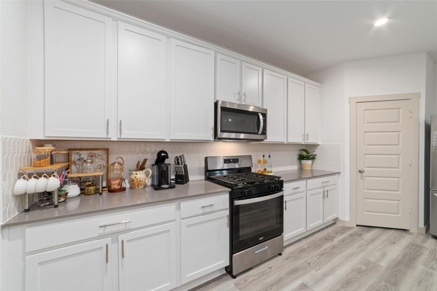 Furnished interior view inside a new home in Parks Edge, Missouri City (Image 14).