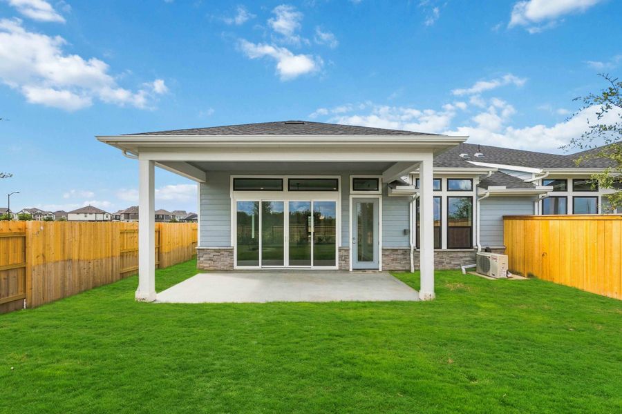 Exterior details and patio area of a home in Elyson, Katy (Image 2).