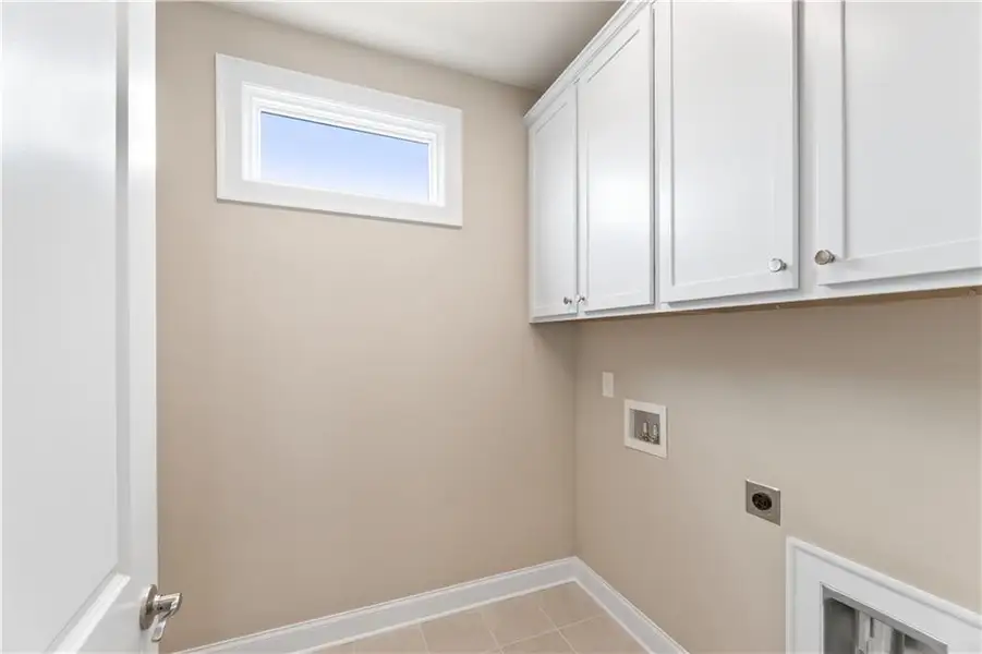 Spacious, unfurnished interior of a new home in The Courtyards at Bailey Farms, Dacula (Image 12).