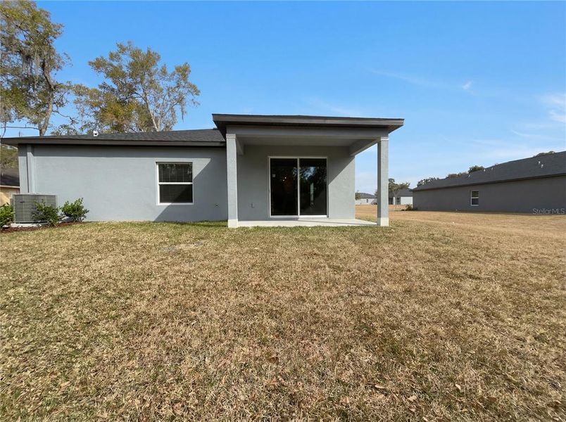 Exterior details and patio area of a home in Grand Park, Dunnellon (Image 18).