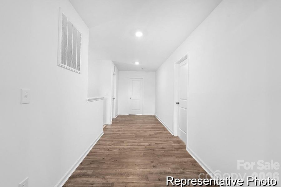 Spacious, unfurnished interior of a new home in Whispering Hills, Locust (Image 37). Spacious, unfurnished interior of a new home in Whispering Hills, Locust (Image 37).