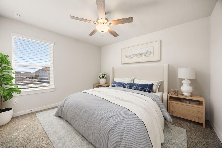 This Guest Suite features plush carpeting, neutral paint, ceiling fan with lighting, a large window with blinds, a spacious closet, and a private ensuite bathroom for added convenience. *Virtually Staged This Guest Suite features plush carpeting, neutral paint, ceiling fan with lighting, a large window with blinds, a spacious closet, and a private ensuite bathroom for added convenience. *Virtually Staged