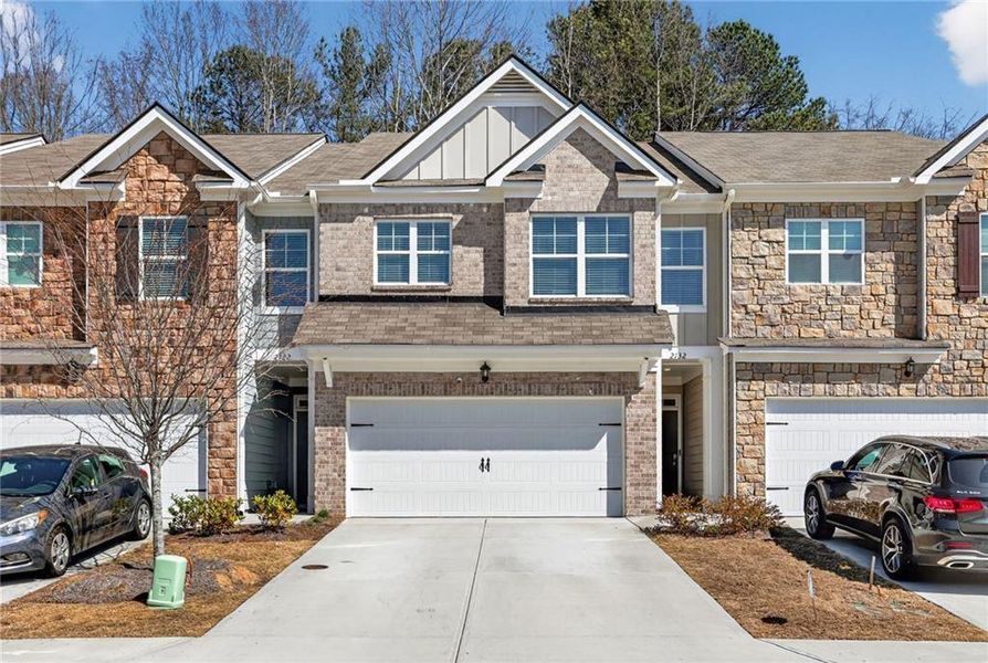 Front exterior of a new home in , Buford, GA, highlighting curb appeal (Image 21).