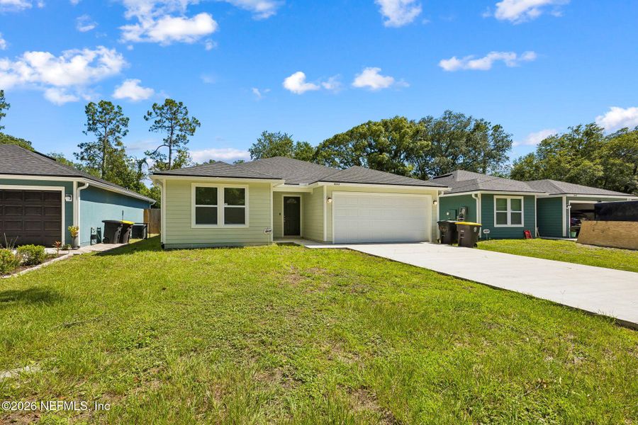 Front exterior of a new home in , Jacksonville, FL, highlighting curb appeal (Image 1). Front exterior of a new home in , Jacksonville, FL, highlighting curb appeal (Image 1).