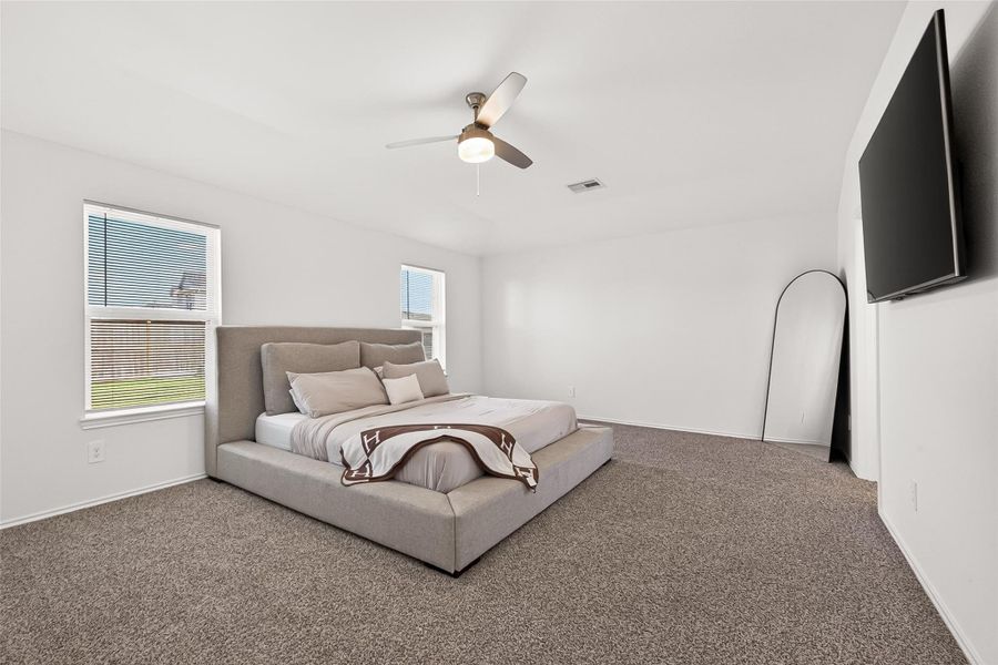 Furnished interior view inside a new home in Sunterra, Katy (Image 4).