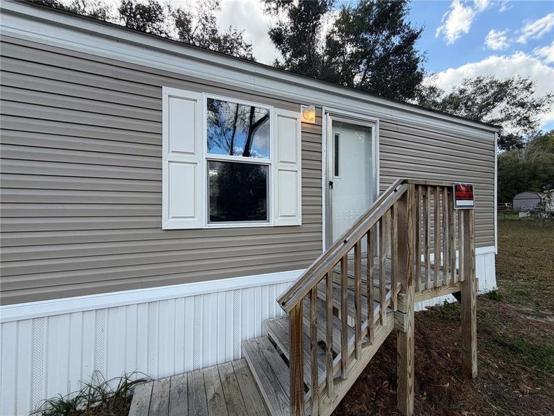 Exterior details and patio area of a home in , Summerfield (Image 21).