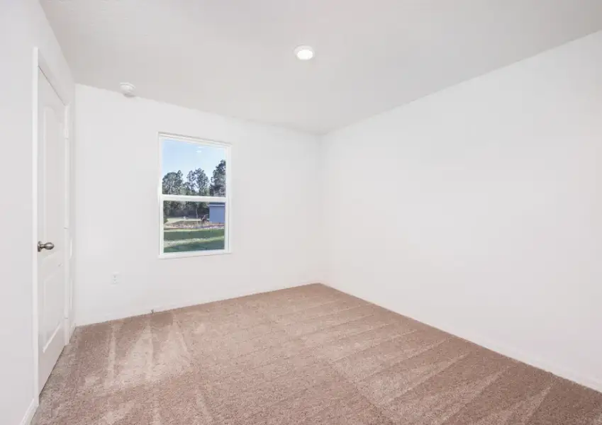 Representative unfurnished interior of a home built from the Hammock by LGI Homes in Marion Oaks, Ocala (Image 20).