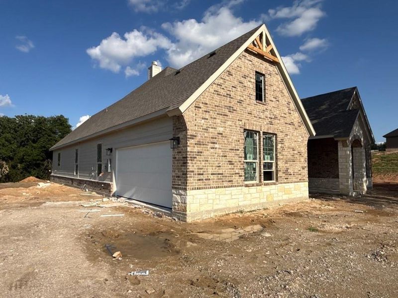 In-progress construction of a new home in Oak Grove Addition, Springtown, TX (Image 6).