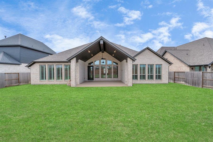 A large back yard big enough for a pool.