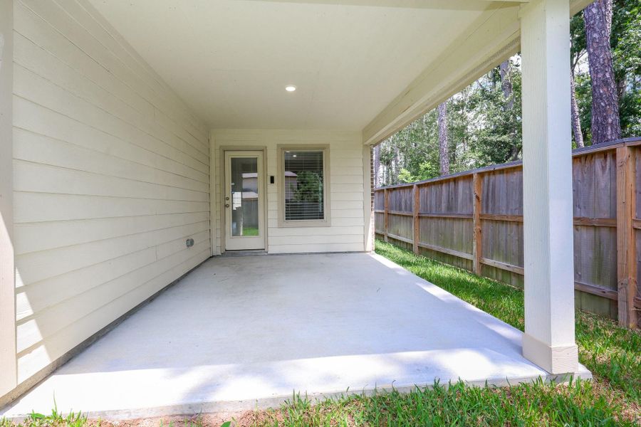Exterior details and patio area of a home in Ladera Creek, Conroe (Image 3). Exterior details and patio area of a home in Ladera Creek, Conroe (Image 3).
