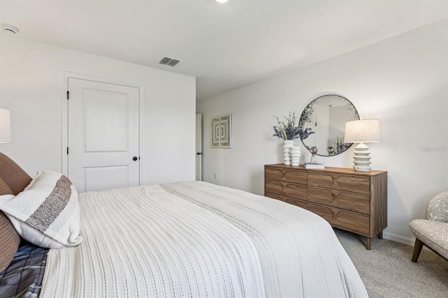 Furnished interior view inside a new home in Hawks Run, Kissimmee (Image 35).