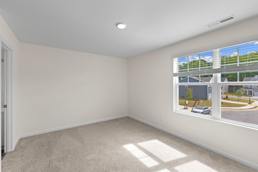 Representative unfurnished interior of a home built from the Discovery by Starlight Homes in Belair Place, Sanford (Image 6). Representative unfurnished interior of a home built from the Discovery by Starlight Homes in Belair Place, Sanford (Image 6).