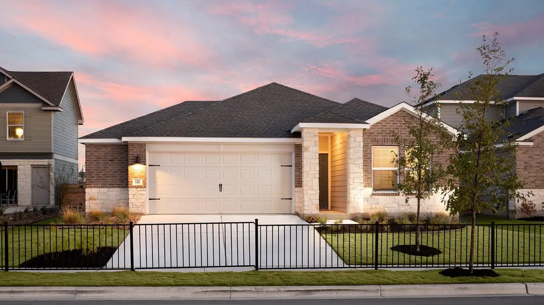 Front exterior of a new home in Meadowlark Preserve: Claremont Collection, Pflugerville, TX, highlighting curb appeal (Image 2).