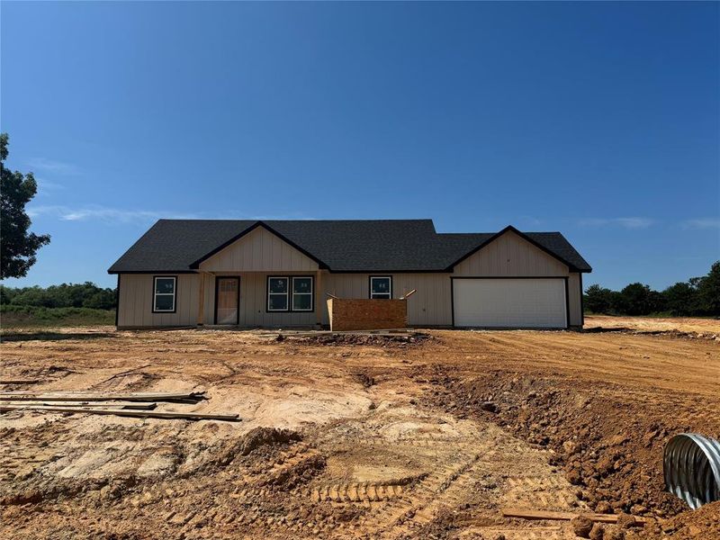 View of front of home with a garage