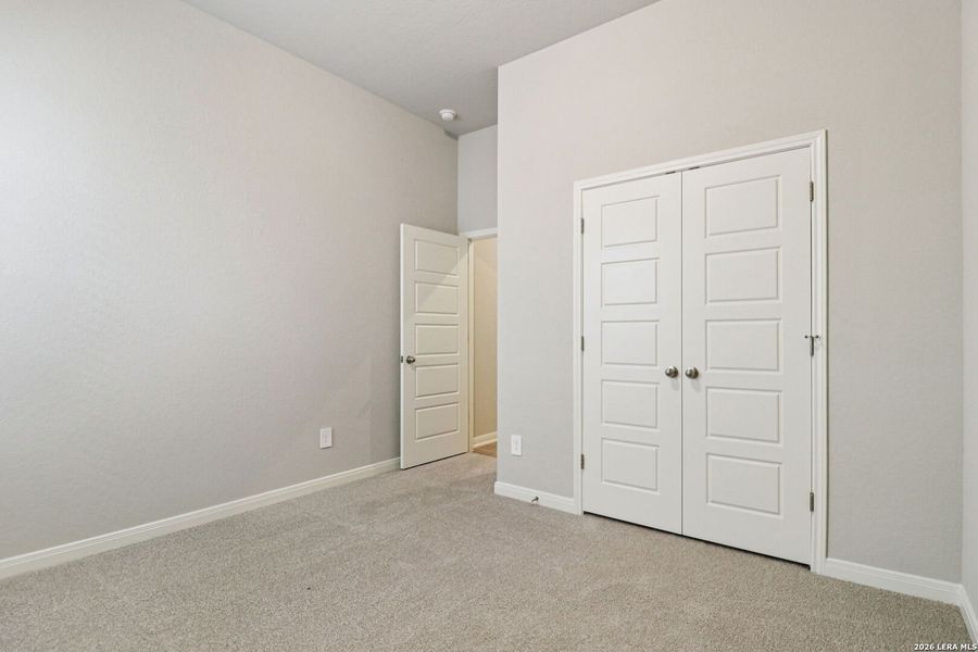 Spacious, unfurnished interior of a new home in Estancia Ranch - Classic Series, San Antonio (Image 19).