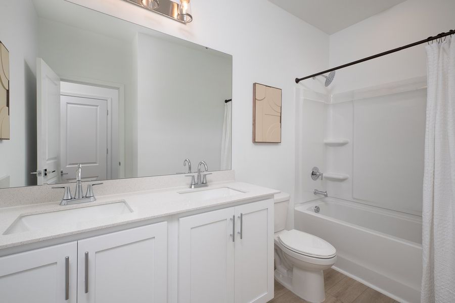 Representative furnished interior of a home built from the Murphy by Ashton Woods in Preserve at The Point, Rolesville (Image 9).
