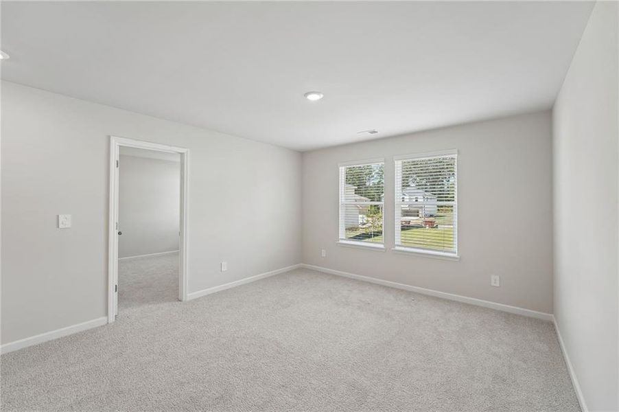 Spacious, unfurnished interior of a new home in Northwoods at Mirror Lake, Villa Rica (Image 41).