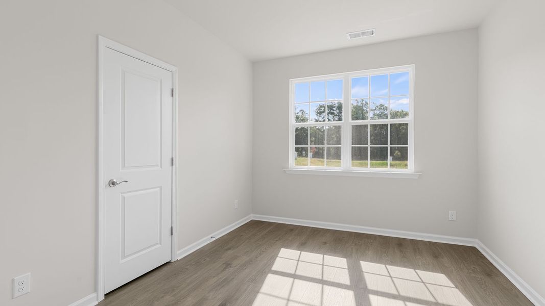 Spacious, unfurnished interior of a new home in The Villas at Kinsley, Jamestown (Image 11).