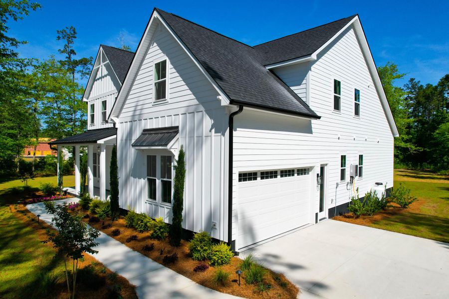 Front exterior of a new home in , Summerville, SC, highlighting curb appeal (Image 25).