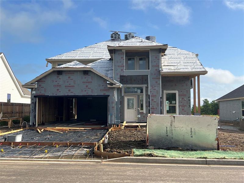 Property in mid-construction featuring fence Property in mid-construction featuring fence