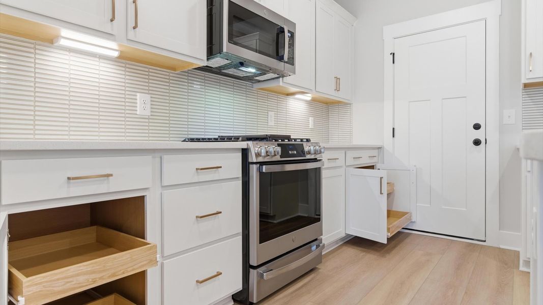 Furnished interior view inside a new home in Village at Midway, Anderson (Image 13).
