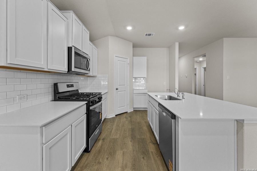 Furnished interior view inside a new home in Brookstone Creek, San Antonio (Image 3).